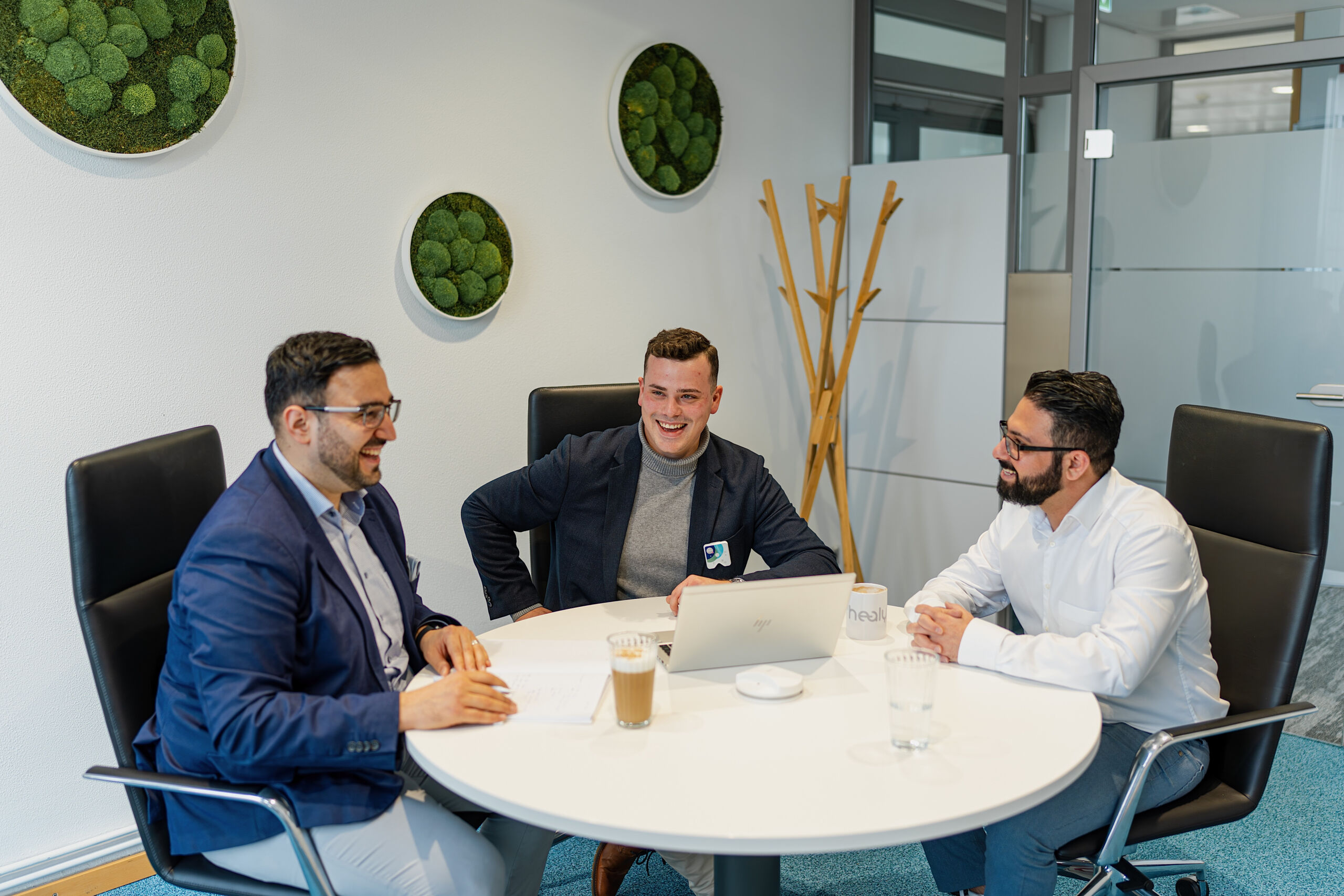 Our team having a meeting in a room